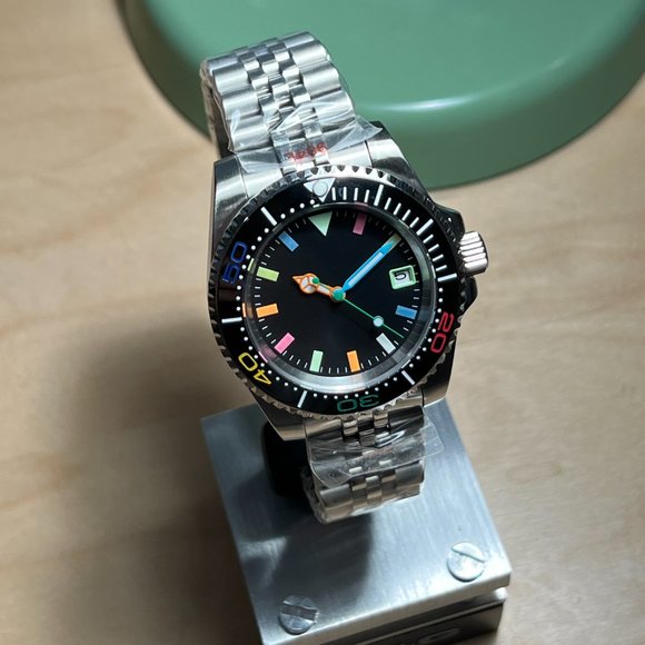 il_fullxfull.4056429612_jwyt.  Custom Made Watch with NH35 Automatic Movement Silver Case Rainbow insert OMG